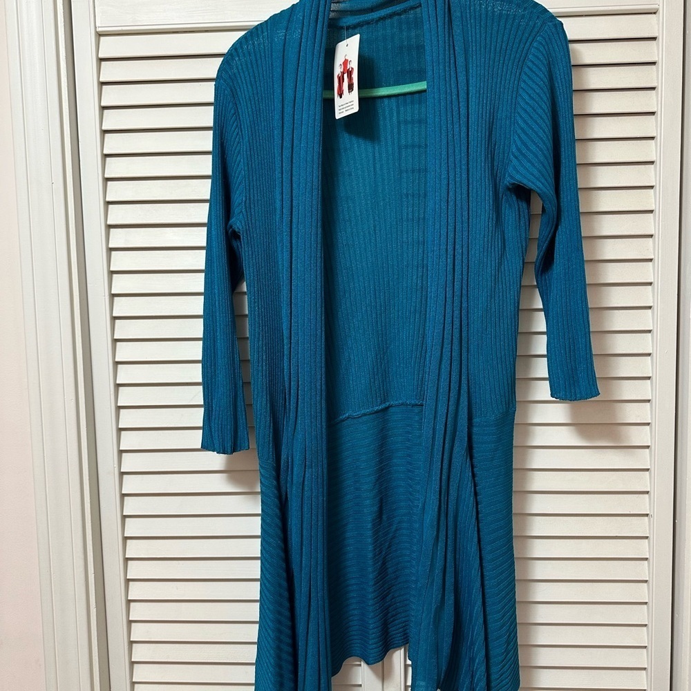 Long sweater . Silk mix. Size large . Brilliant turquoise .Lightweight. NWT
